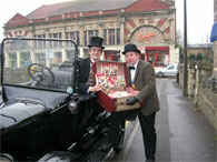 Phileas Fogg (David Moger) and Passepartout (Graham Tuckwell) outside the Curzon Cinema, Clevedon.