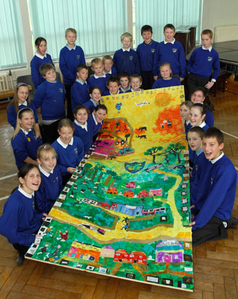 Pupils at New Oak Primary with their Portrait of a Nation collage (Martin Chainey).