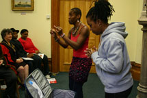 Ruth Pitter and Valerie Mower performing an extract from the Our Stories Make Waves' assembly on migration at the Bristol launch (Laura Thorne).