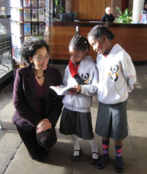 Andrea Levy pictured with Beatlife drummers from Windsor Primary School in Liverpool.