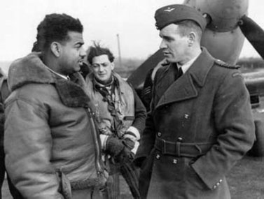 Jamaican Flight Sergeant Vincent Bunting in conversation with the Station Commander at RAF Biggin Hill, January 1943. This photo is taken from Jan Safarik's website of air aces.