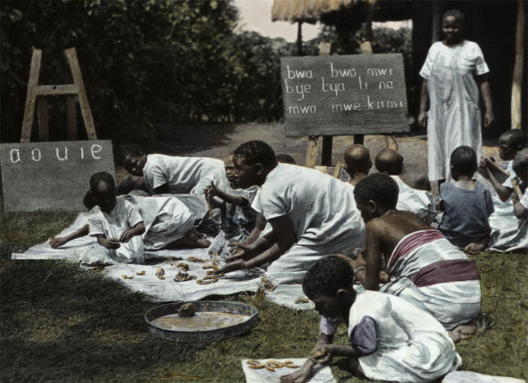 Lantern slide by the Christian Missionary Society showing an East African kindergarten class in the 1890s. 