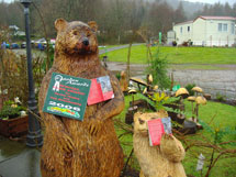 Some unusual readers pictured at Argyll Caravan Park, Inveraray. (Full size, ornamental bears)